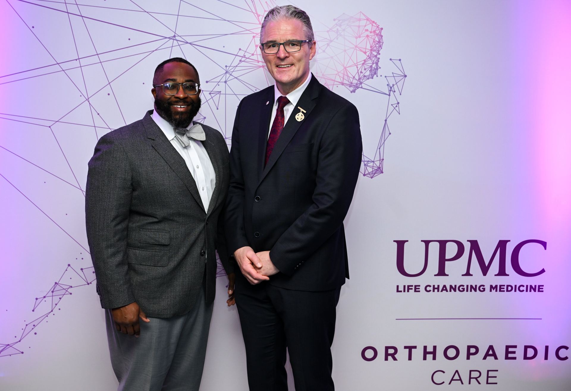 MaCalus Hogan, MD, MBA Chair of UPMC Orthopaedic Care with Jarlath Burns President of the Gaelic Athletic Association GAA.